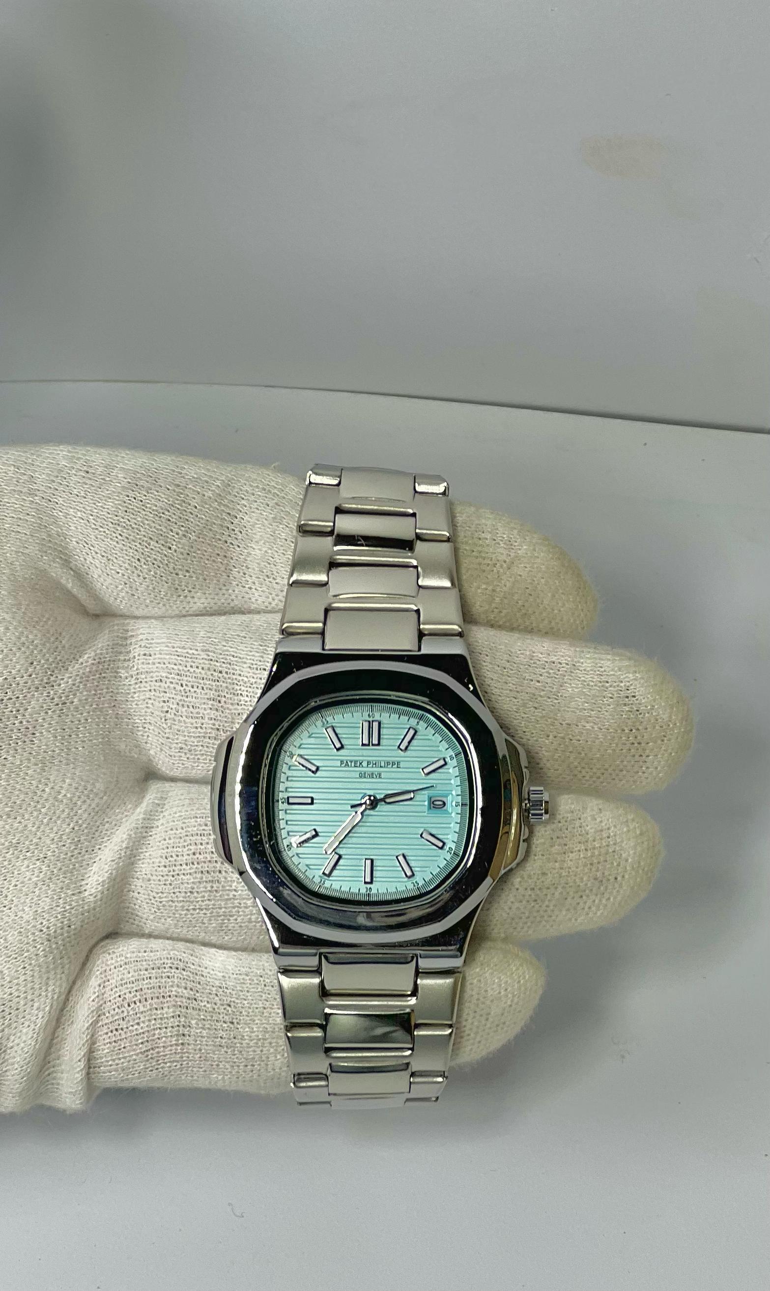 Patek Philippe Nautilus Silver Blue Dial – Luxury Timepiece