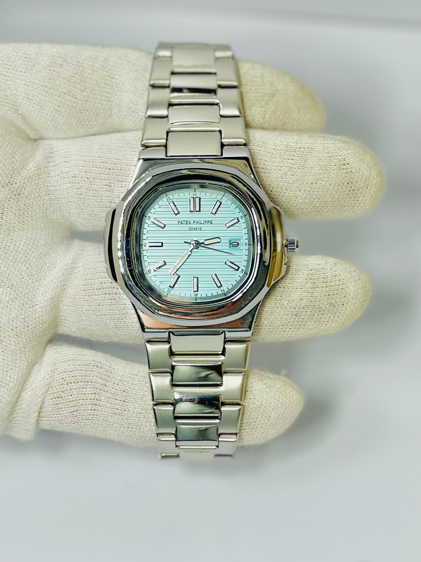 Patek Philippe Nautilus Silver Blue Dial – Luxury Timepiece